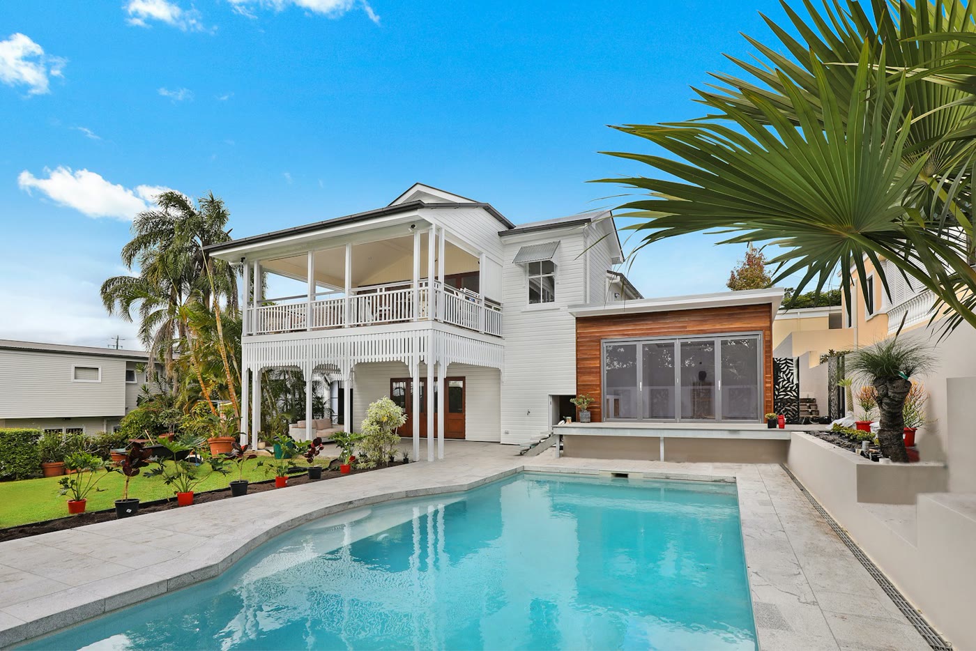 Suburban home exterior with landscaped front yard