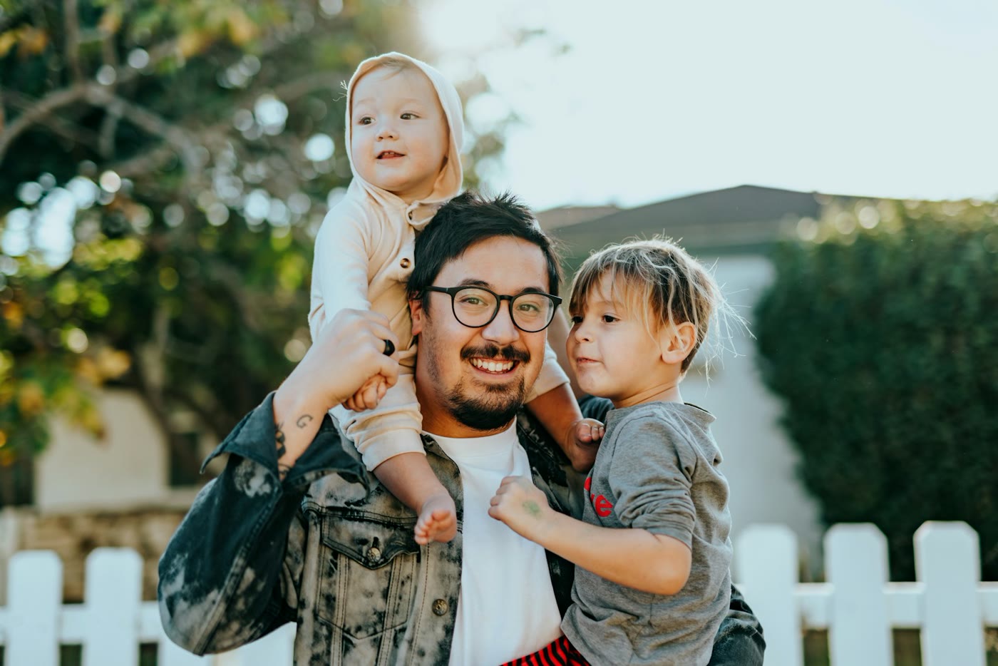 Parent with children outside a family home